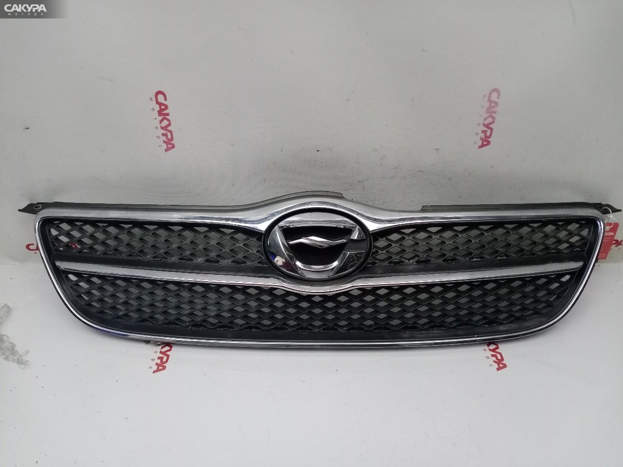 Решетка радиатора Toyota Corolla Fielder NZE124G 1NZ-FE: купить в Сакура Красноярск.