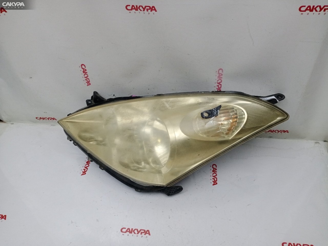 Фара левая Toyota Wish ANE10G 1AZ-FSE 68-1: купить в Сакура Красноярск.
