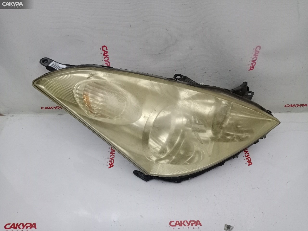 Фара правая Toyota Wish ANE10G 1AZ-FSE 68-1: купить в Сакура Красноярск.