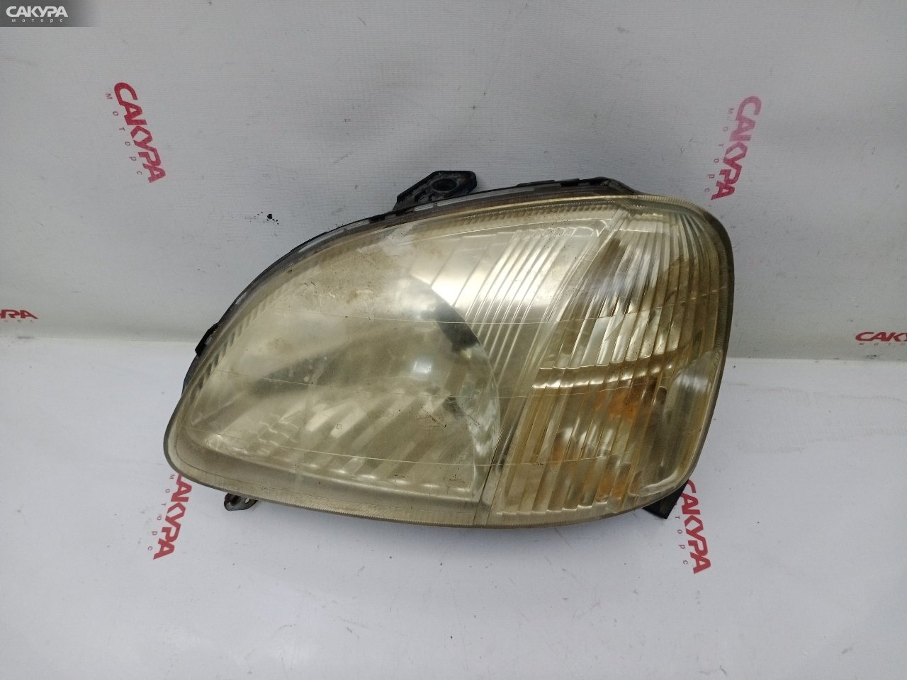 Фара левая Honda Logo GA3 P0151: купить в Сакура Красноярск.