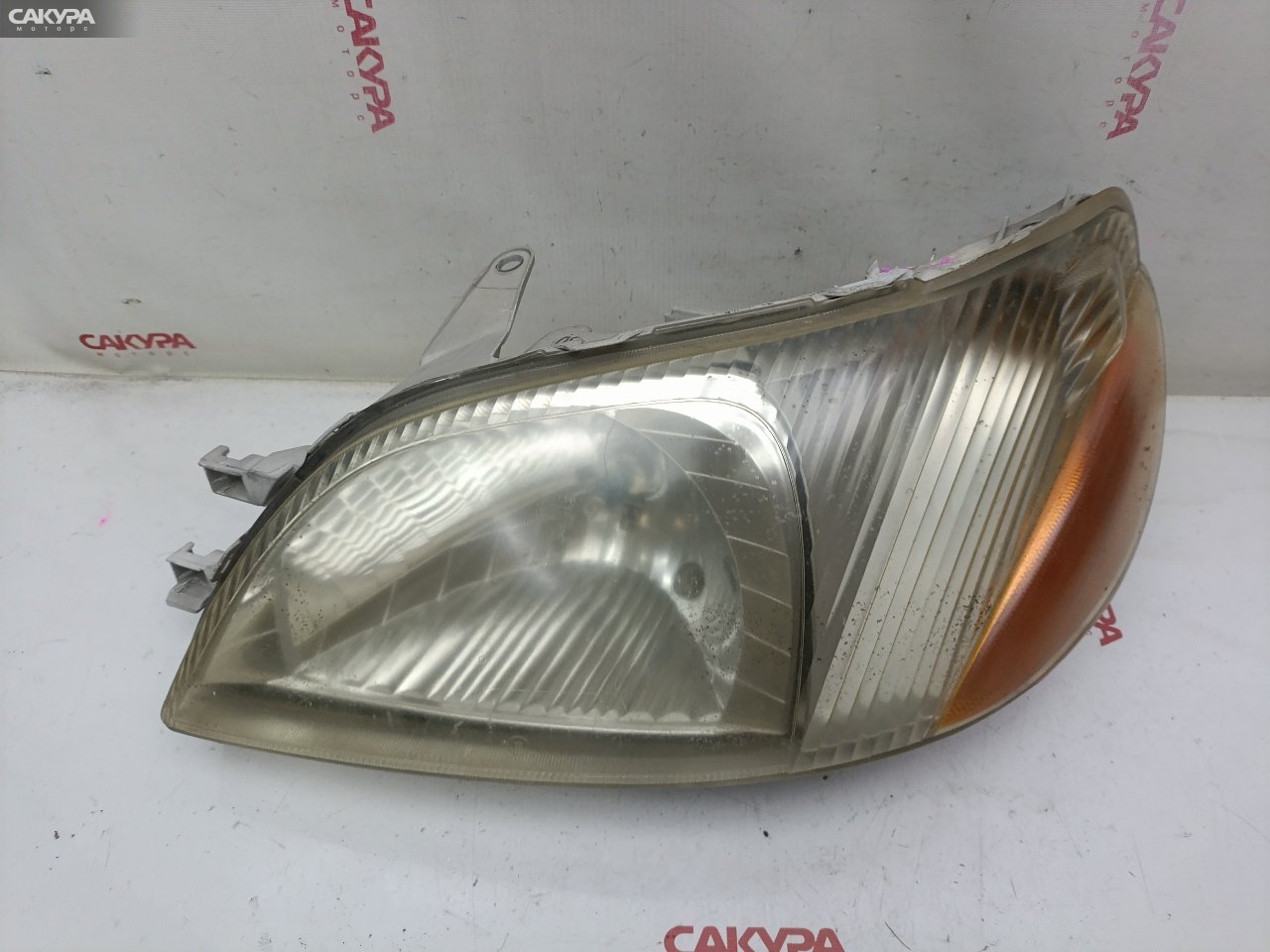 Фара левая Toyota Platz NCP12 1NZ-FE 52-009: купить в Сакура Красноярск.