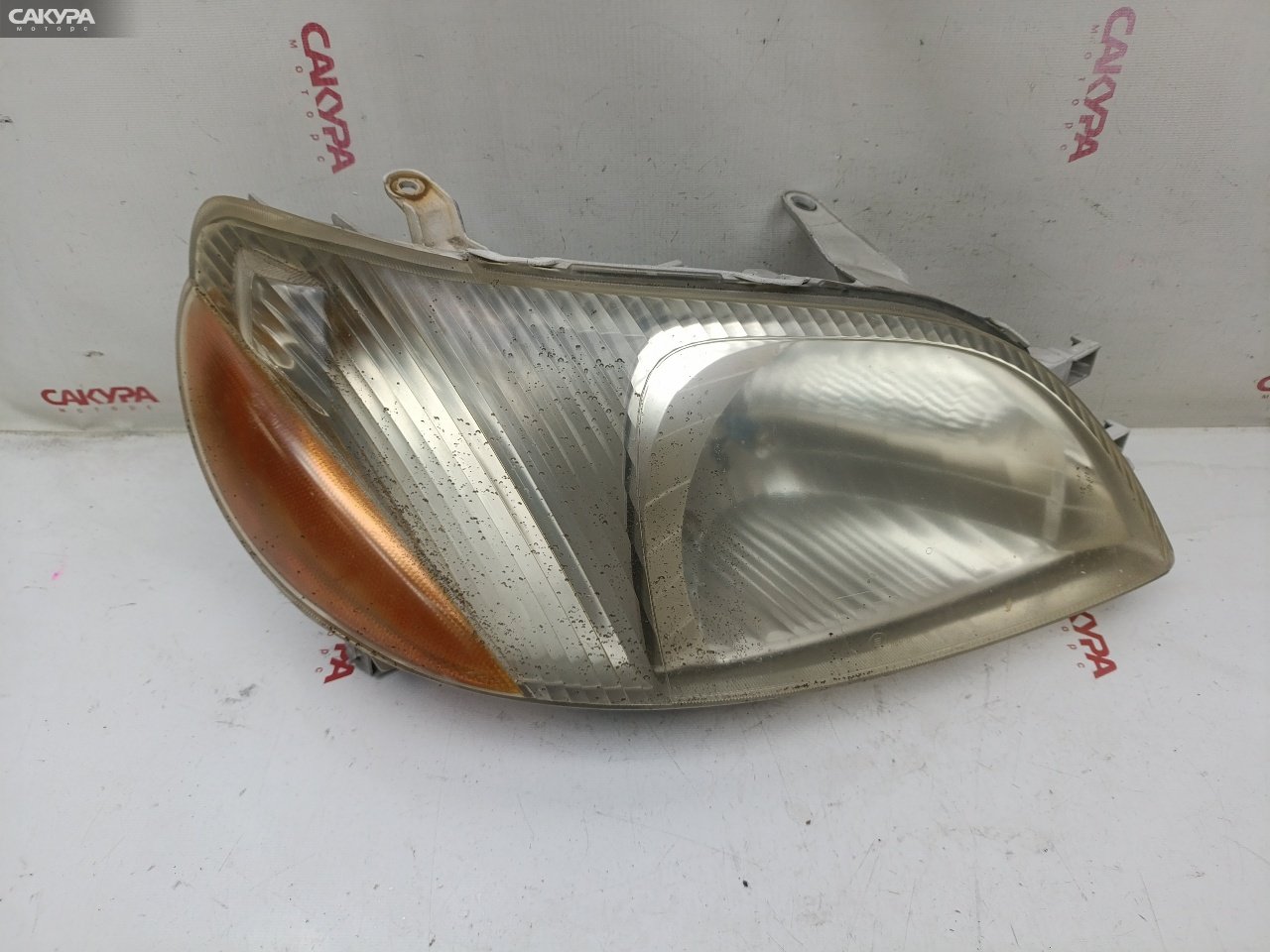 Фара правая Toyota Platz NCP12 1NZ-FE 52-009: купить в Сакура Красноярск.