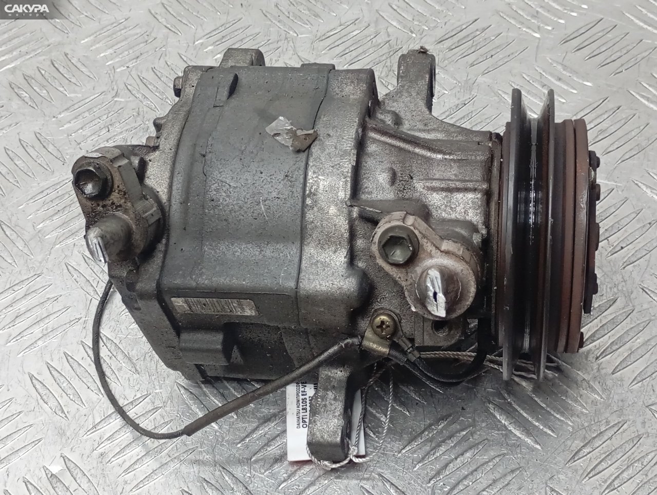 Компрессор кондиционера Daihatsu Opti L810S EF-VE: купить в Сакура Красноярск.
