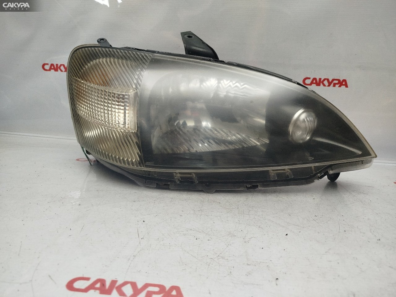 Фара правая Daihatsu YRV M201G K3-VE P1101: купить в Сакура Красноярск.