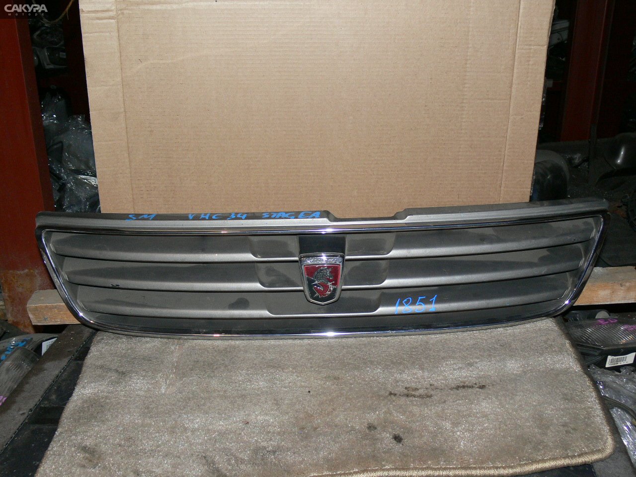Решетка радиатора Nissan Stagea WHC34: купить в Сакура Иркутск.
