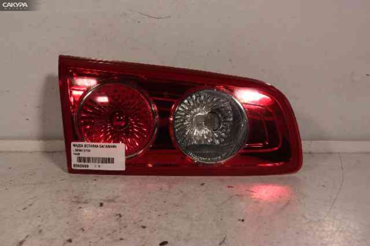 Фонарь вставка багажника левый Mazda Demio DY3W P4420: купить в Сакура Абакан.