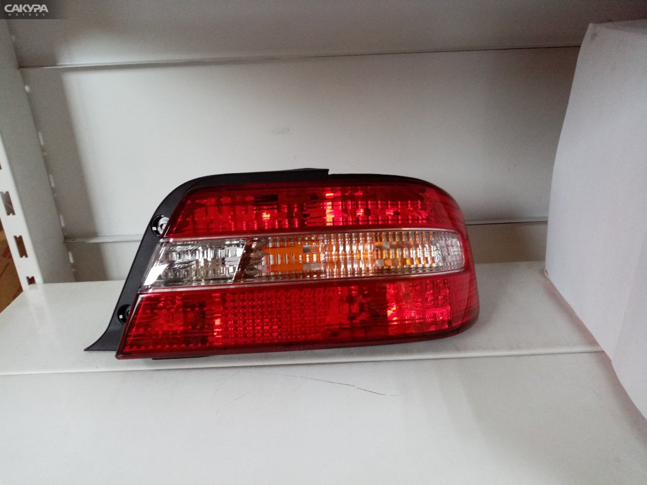 Фонарь стоп-сигнала правый Toyota Chaser GX100 22-254: купить в Сакура Абакан.
