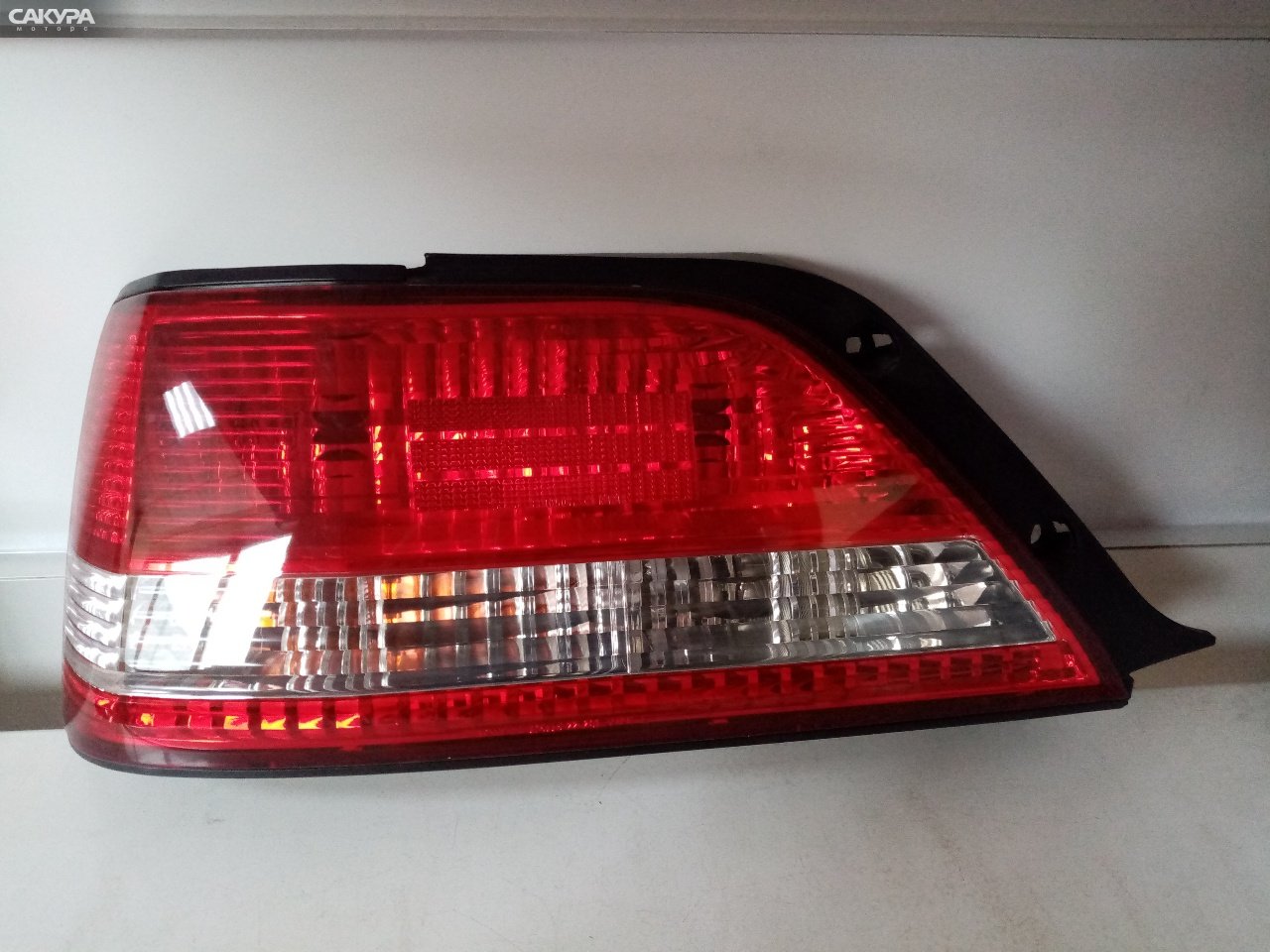 Фонарь стоп-сигнала левый Toyota Cresta GX100 22-261: купить в Сакура Абакан.