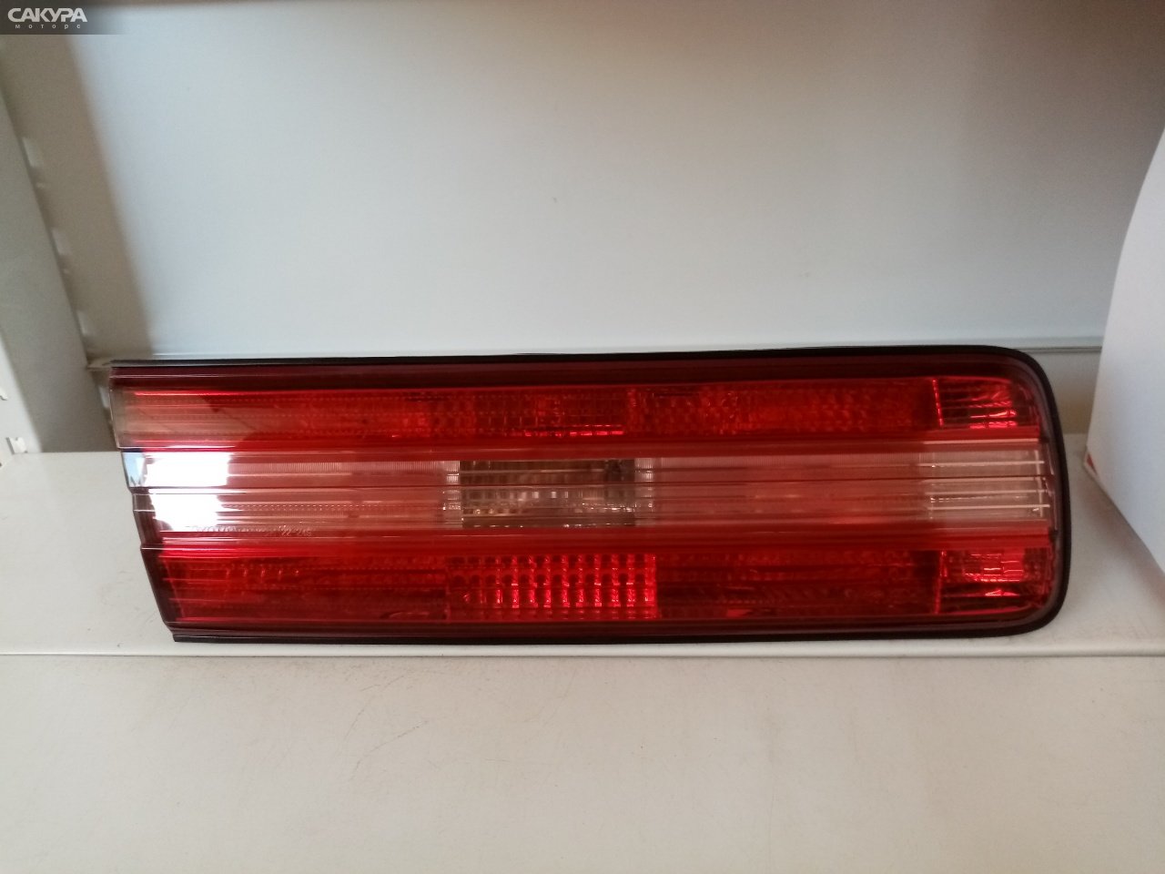 Фонарь вставка багажника левый Toyota Mark II GX100 22-249: купить в Сакура Абакан.