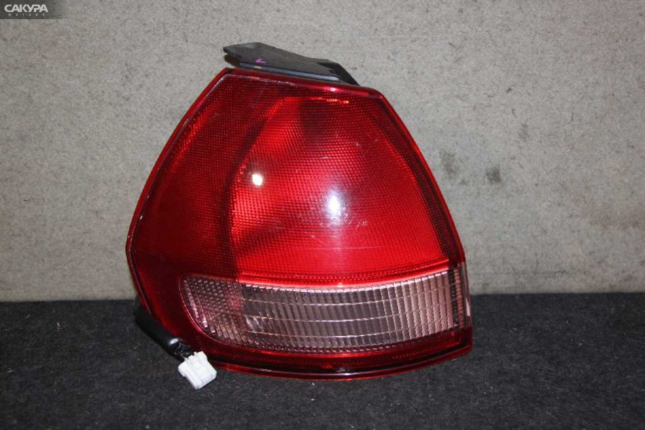Фонарь стоп-сигнала левый Nissan Wingroad WFY11 220-24824: купить в Сакура Абакан.