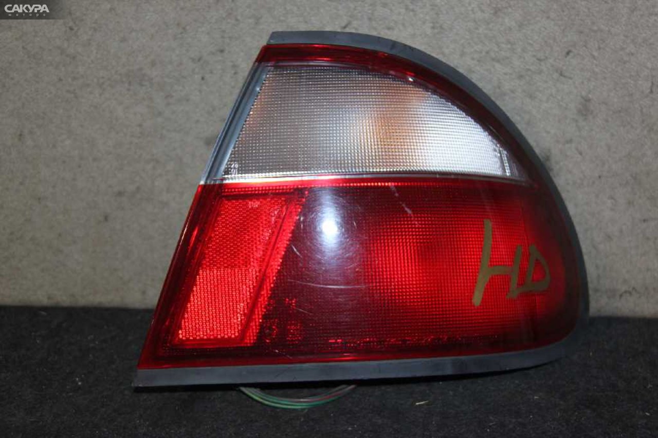 Фонарь стоп-сигнала правый Mazda Familia BHALP 220-61700: купить в Сакура Абакан.