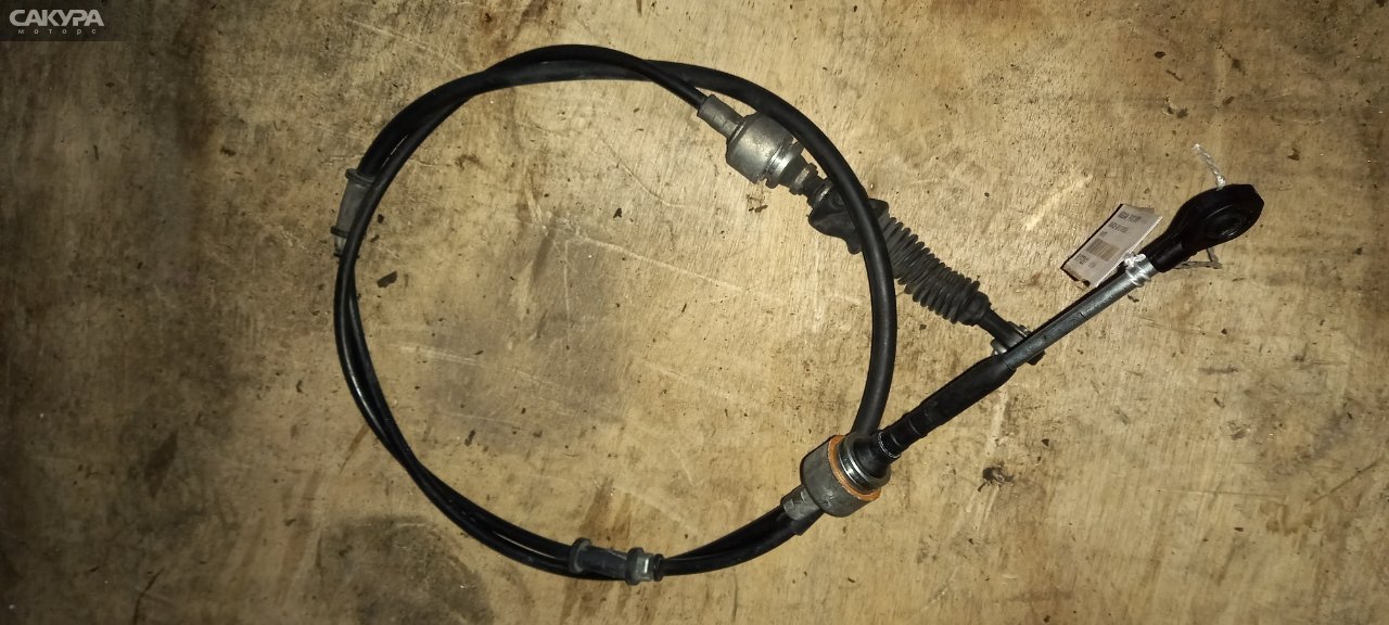 Трос КПП Nissan March AK12 CR12DE: купить в Сакура Абакан.