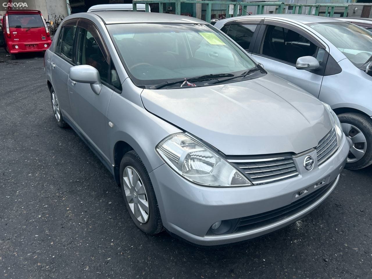 Бампер передний Nissan Tiida Latio SC11: купить в Сакура Абакан.