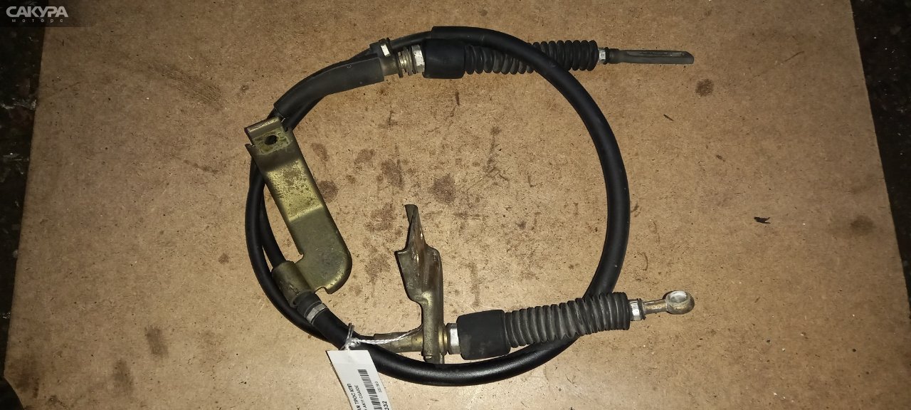 Трос КПП Nissan March AK11 CGA3DE: купить в Сакура Абакан.