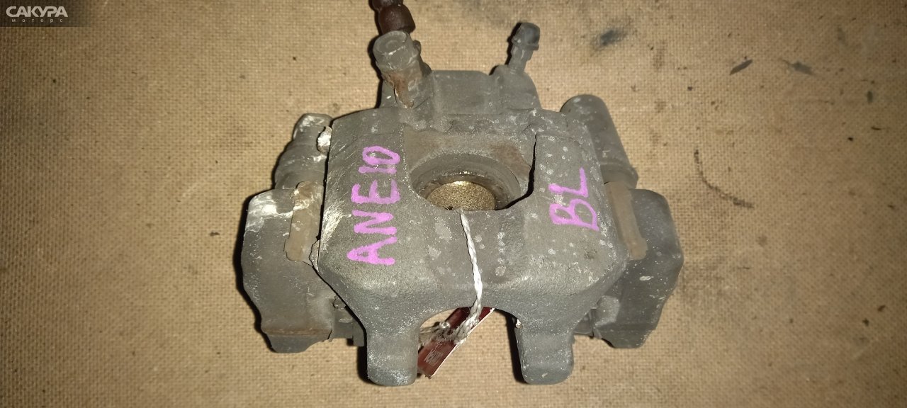 Суппорт задний левый Toyota Wish ANE10 1AZ-FSE: купить в Сакура Абакан.