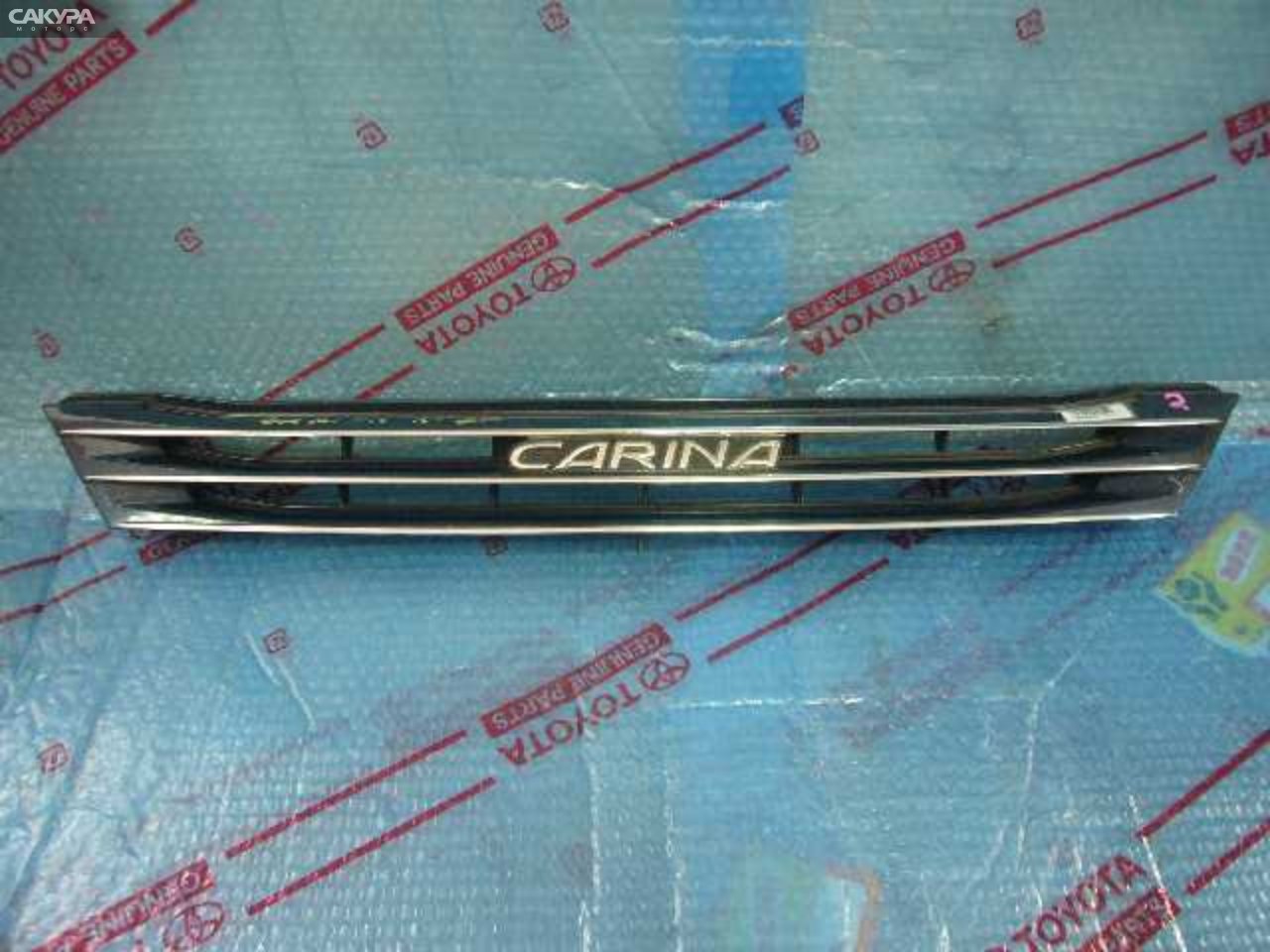 Решетка радиатора Toyota Carina AT210: купить в Сакура Кемерово.