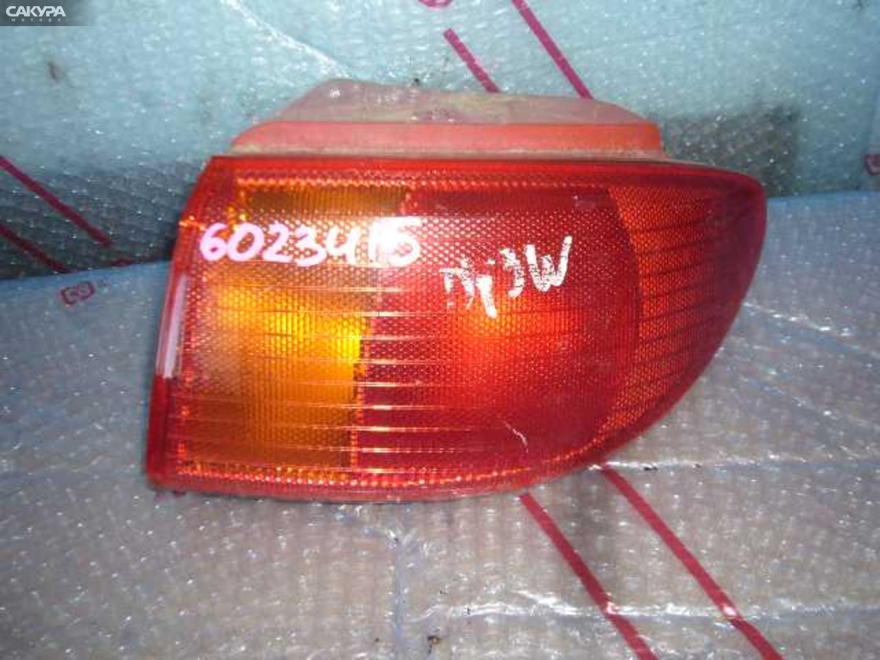 Фонарь стоп-сигнала правый Mazda Demio DY3W P1977: купить в Сакура Кемерово.