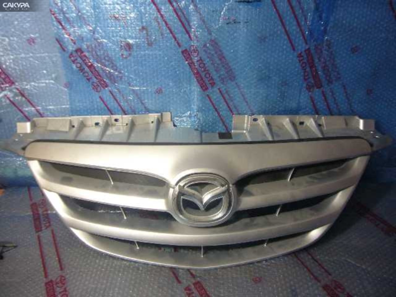 Решетка радиатора Mazda MPV LWEW: купить в Сакура Кемерово.