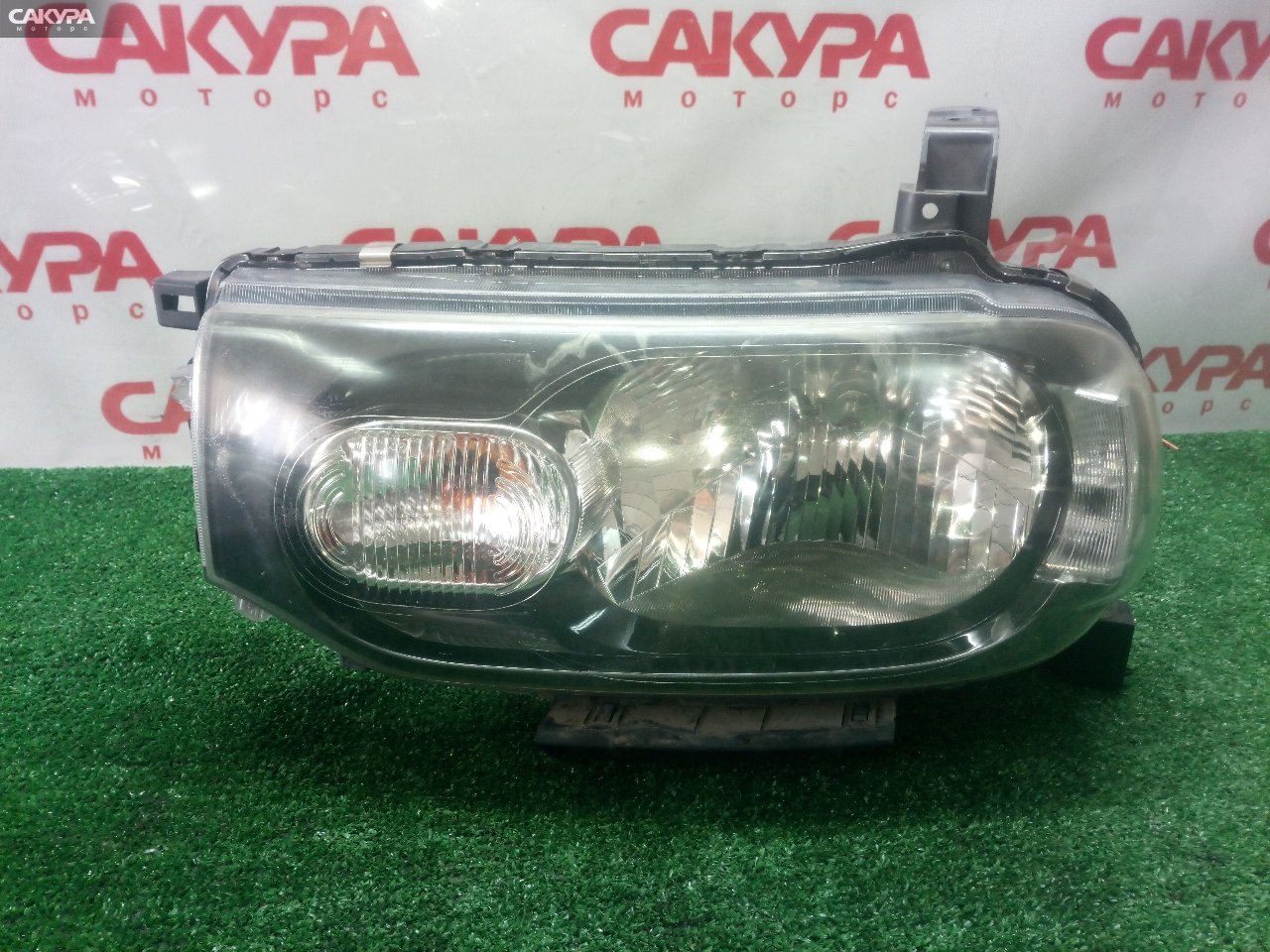 Фара левая Nissan Cube Z12 P8190: купить в Сакура Кемерово.